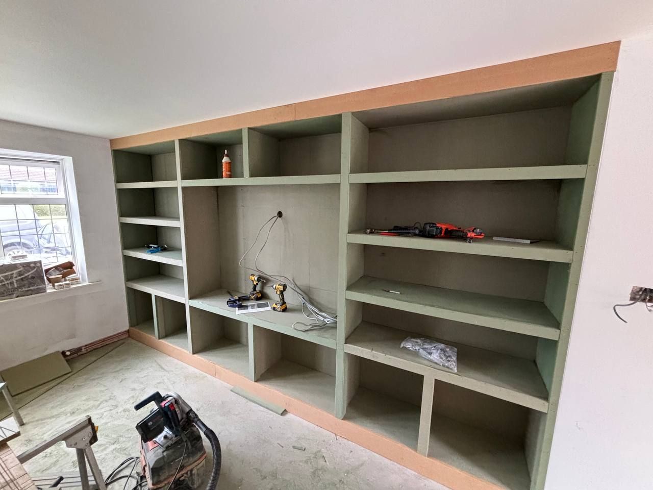 The same unit as a raw MDF carcass mid-build