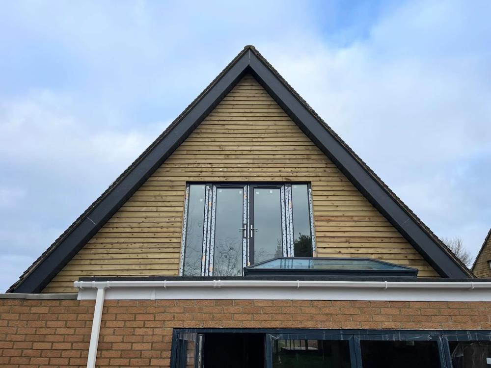 Gable end with new timber cladding